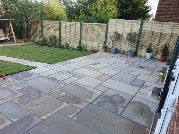 Our patio team installing a patio in Wivenhoe