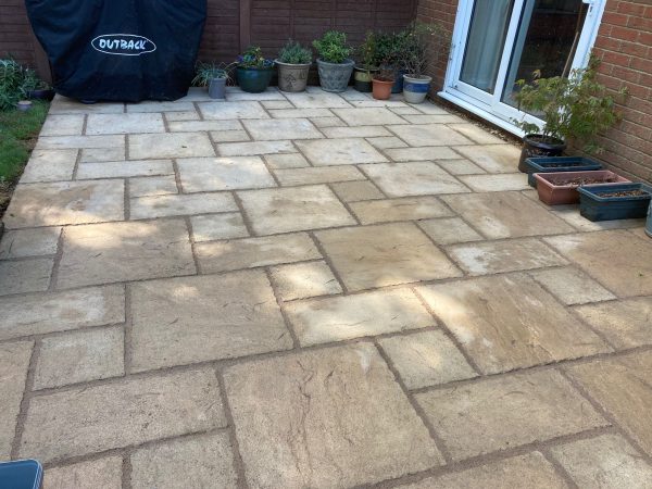 Riven slabbed patio installation in Wivenhoe